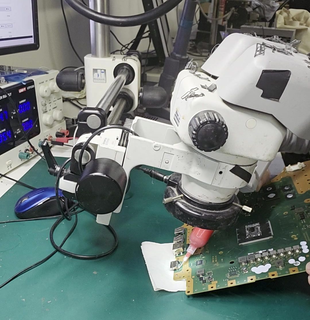 The microscope bench, where board and drive electronics are diagnosed.